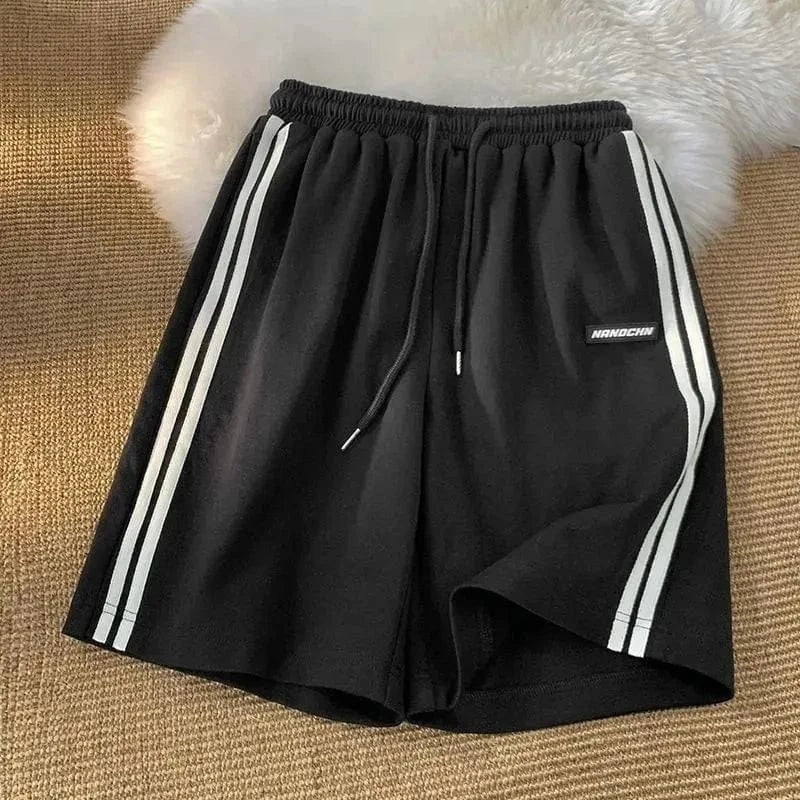 Pantalones de chándal a rayas laterales para mujer, pantalones cortos rectos sueltos de cintura alta para correr, pantalones cortos de pierna ancha informales en blanco y negro a la moda de verano