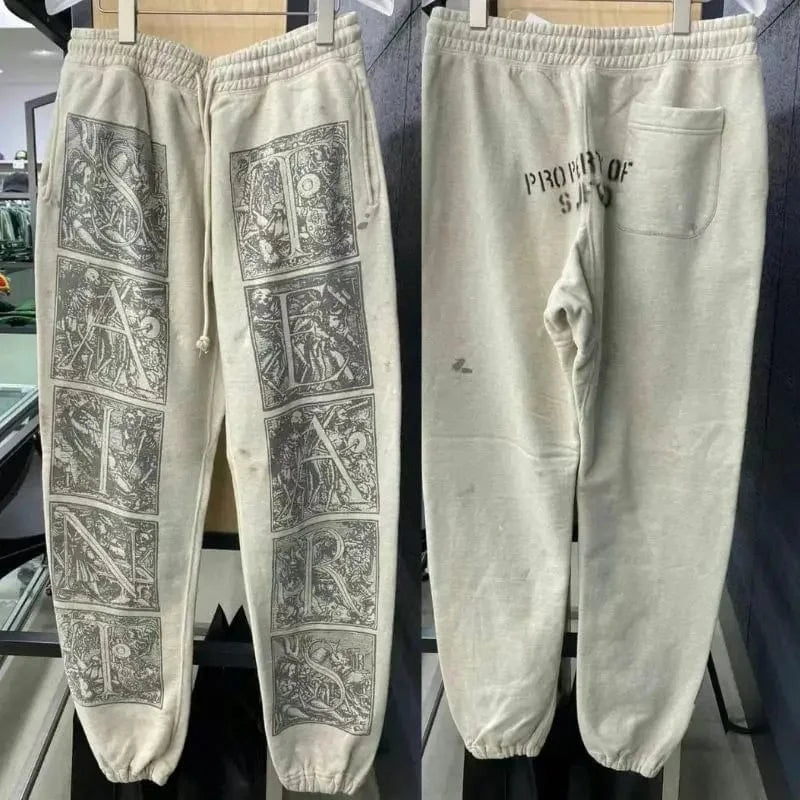 Sudaderas con capucha de gran tamaño Hiphop Street Retro Saint, sudaderas con estampado de grafiti a cuadros y daños lavados, pantalones, chándal para hombres y mujeres